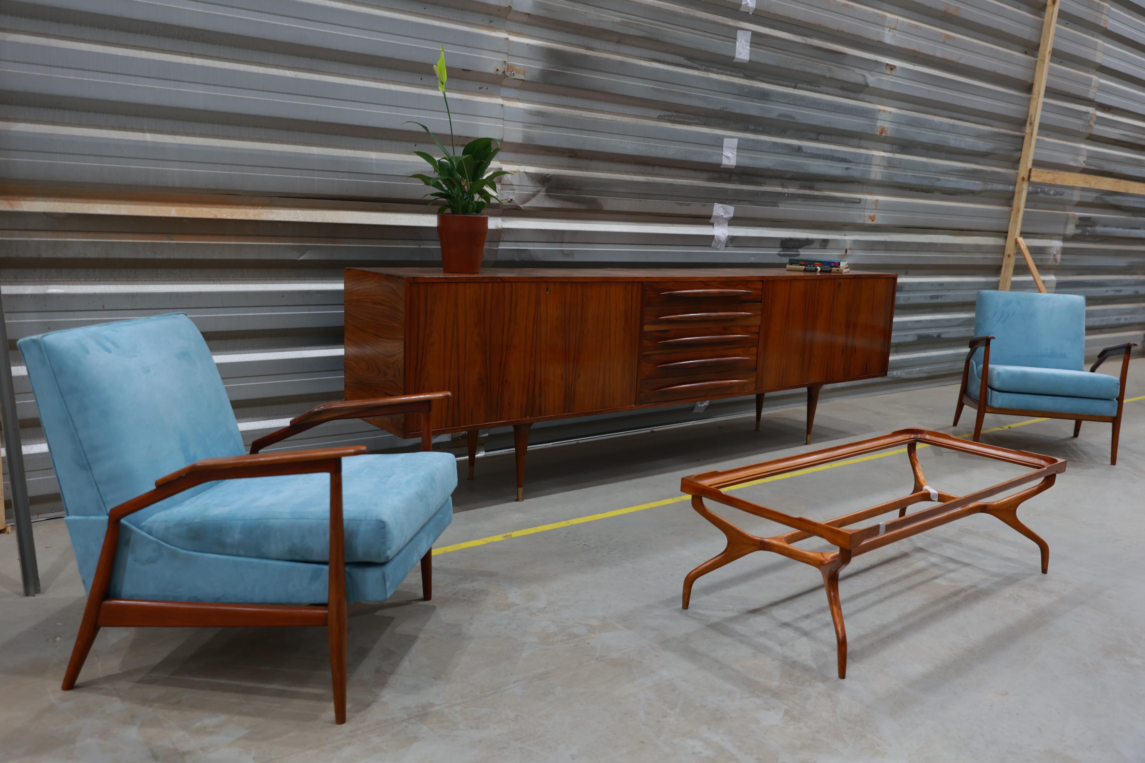 Available today, this Brazilian Modern Credenza in Hardwood by Giuseppe Scapinelli, 1950��’s is nothing less than spectacular!

This credenza was designed by Giuseppe Scapinelli in the 1950s. It is made with Brazilian rosewood (also known as