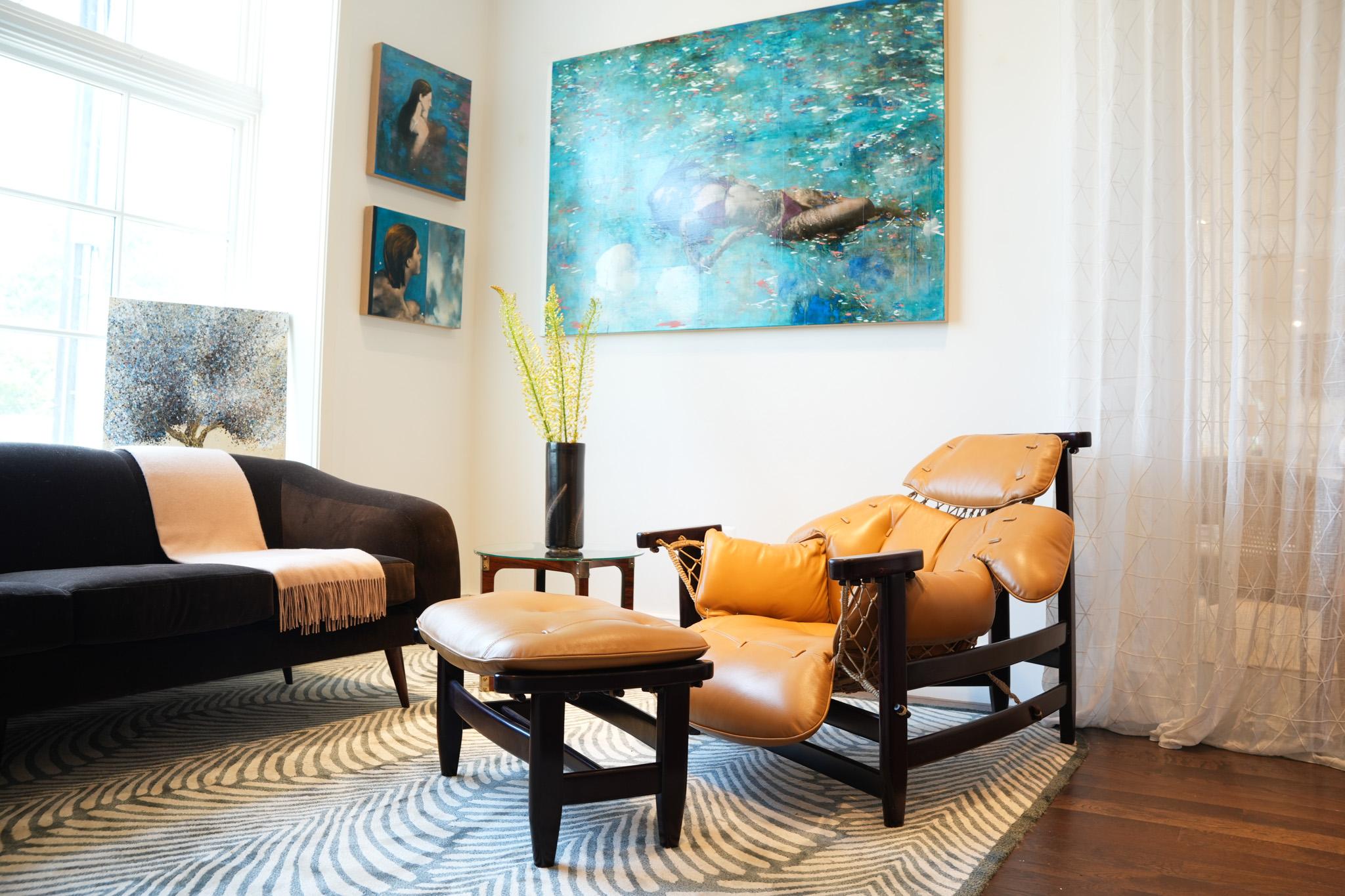 Available today, this Brazilian Modern “Jangada” lounge chair with stool in hardwood & leather by Jean Gillon designed in the 1960s is absolutely gorgeous!

The chair's name, 