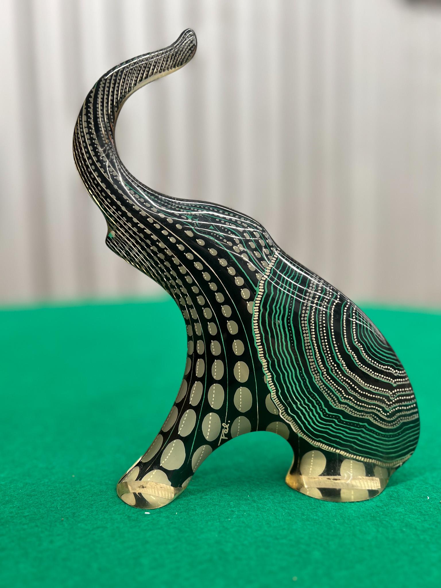 This Brazilian modern sculpture of an elephant was designed by Abraham Palatinik in the 1960s. It is part of the Artemis collection that features several different animals, each with sleek, flat silhouettes. Original label on the bottom of the