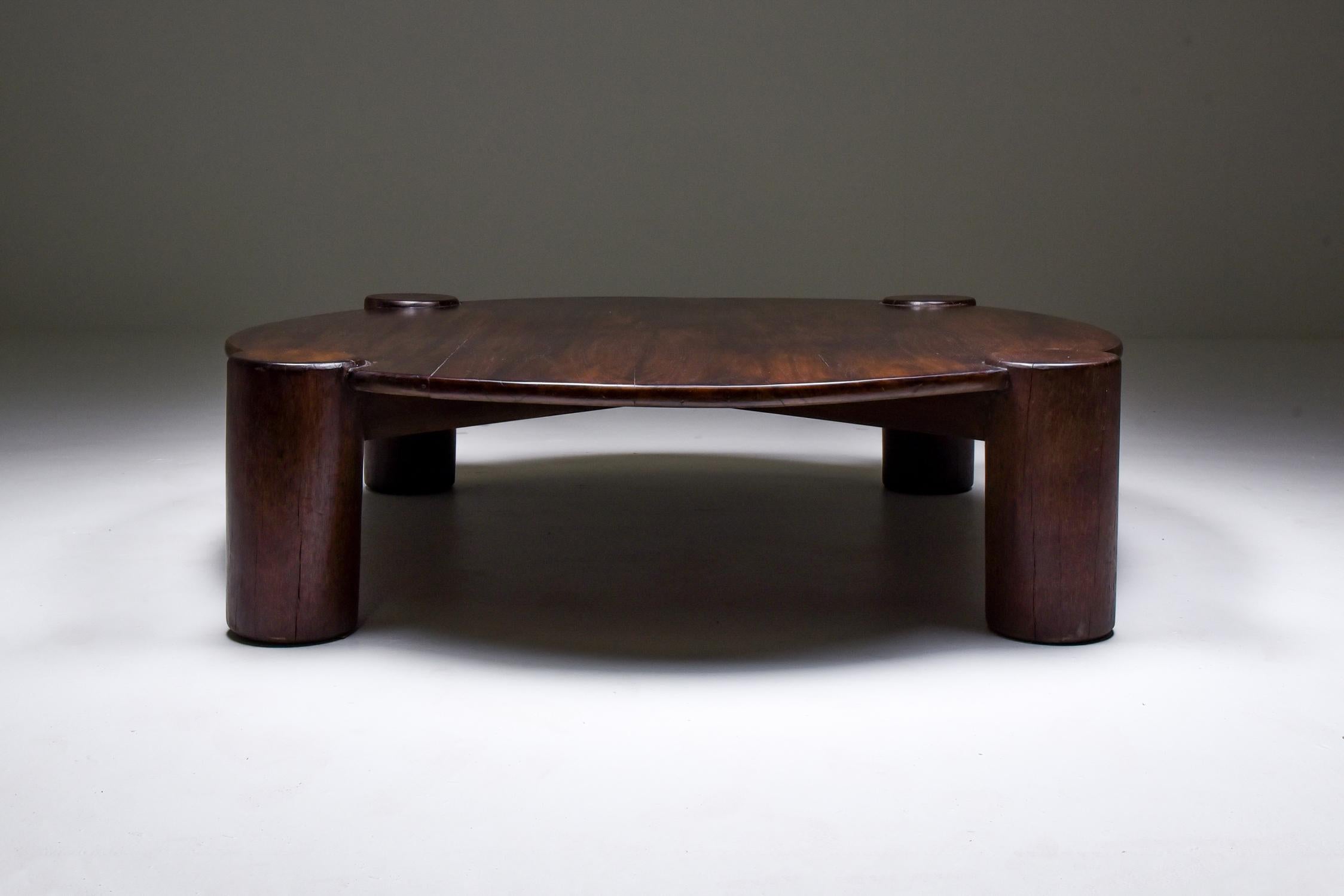 Brazilian modern coffee table, round, walnut and palmwood, Brazil 1960s

Unusual oversize round coffee table 
Top in stained walnut, resting on four pillars made of palmwood. Taking several decades or even centuries for palmwood to grow this