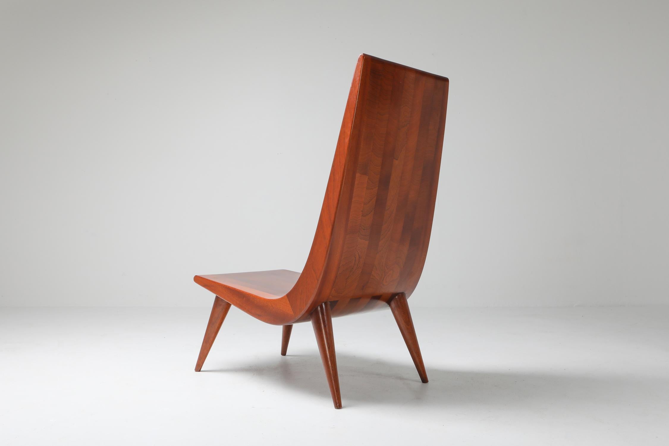 Mid-Century Modern solid wood pair of lounge chairs, Brazil, 1970s

Zanine Caldas, Zalszupin, Tenreiro, Carlo Hauner, Niemayer are many of the great Brazilian modern designers of the 20th century.
These pieces fit their style and quality.

 