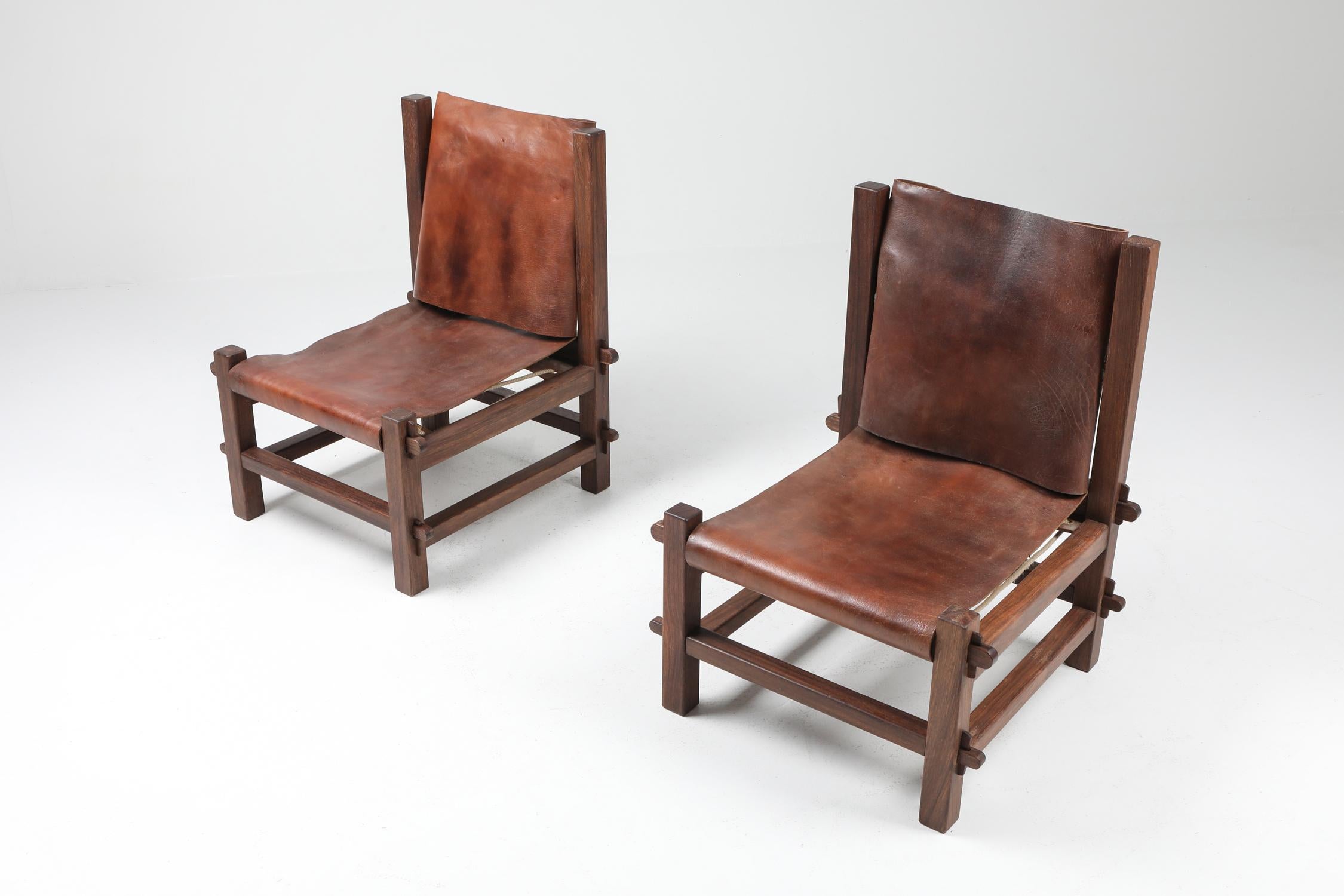 Jacaranda and leather easy chairs, Brazil 1960s

Brutalist and modernist pair of easy chairs. In the style of great Brazilian designers such as Zalszupin, Lafer, Rodrigues and more.
This pair, which sourced in the Netherlands, was imported in the