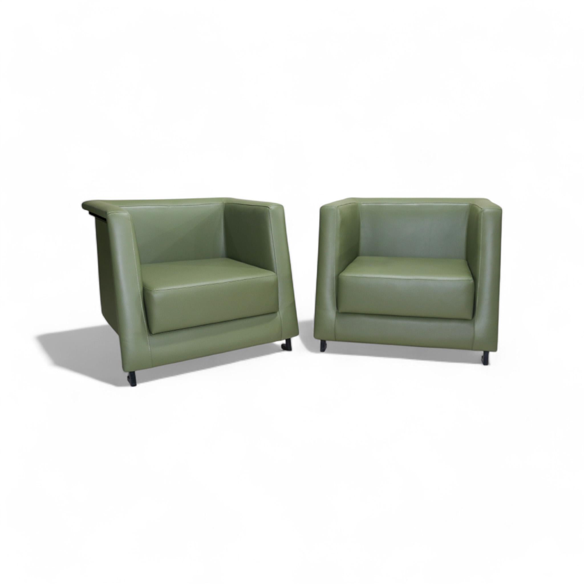 Available today, with domestic shipping in NYC metro area included, this Brazilian Modern Pair of Armchairs in Green Leather, by Geraldo de Barros, c. 1970s, is nothing less than gorgeous!  

This pair of armchairs was designed by Geraldo de Barros