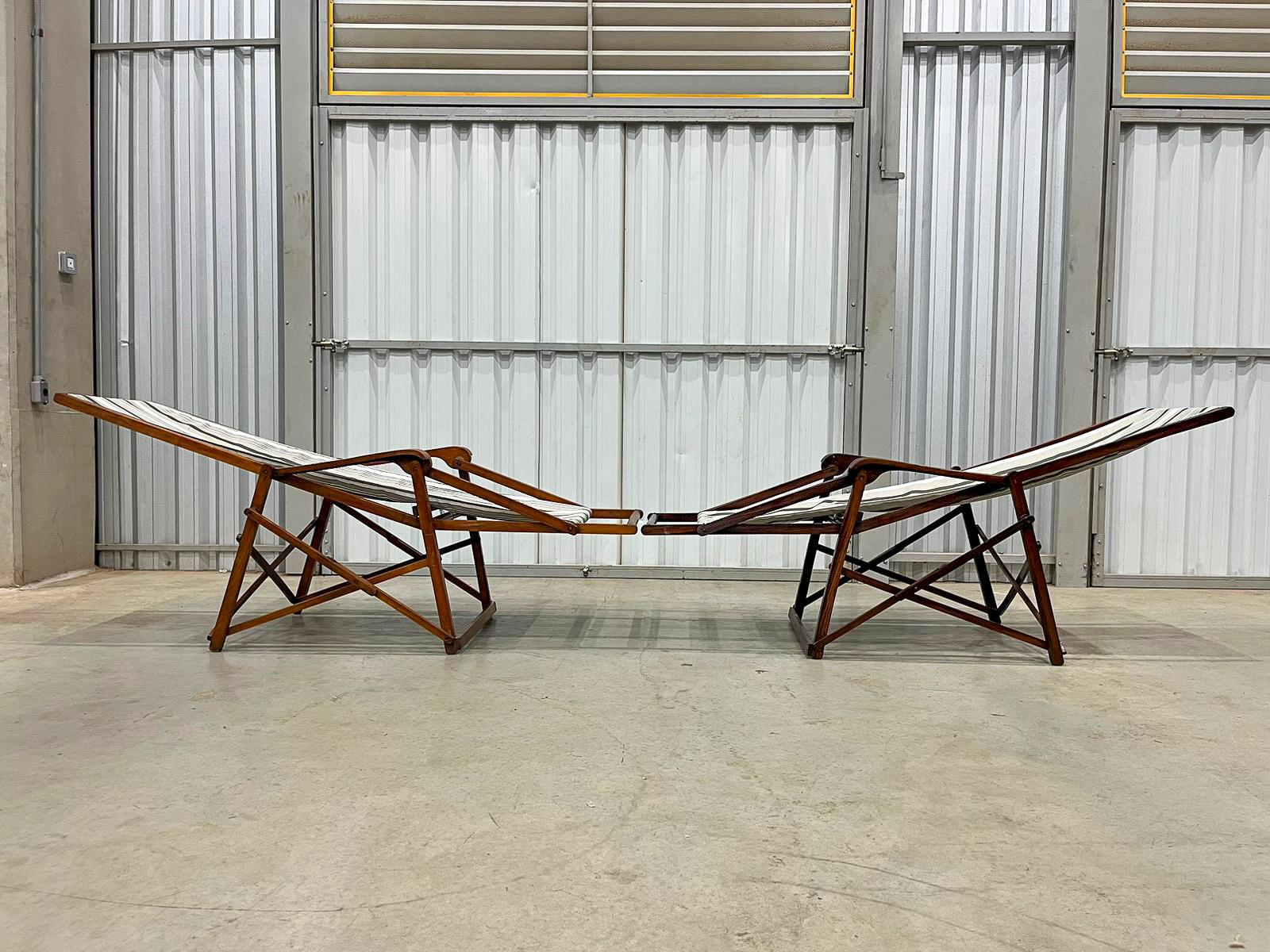 Paire de chaises longues modernes brésiliennes en bois dur et tissu par Lucio Costa 1950 Bon état - En vente à New York, NY