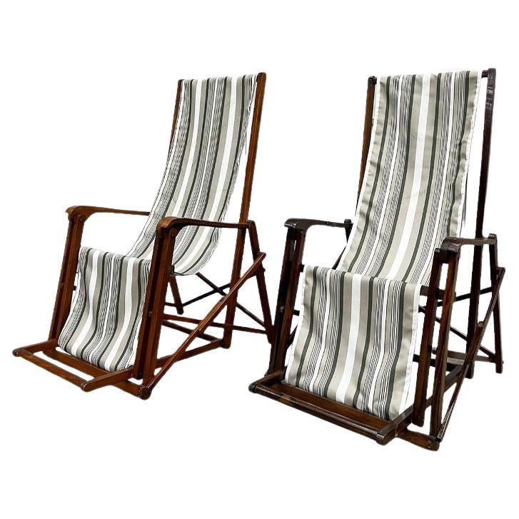 Coppia di chaise longue moderne brasiliane in legno e tessuto di Lucio Costa 1950