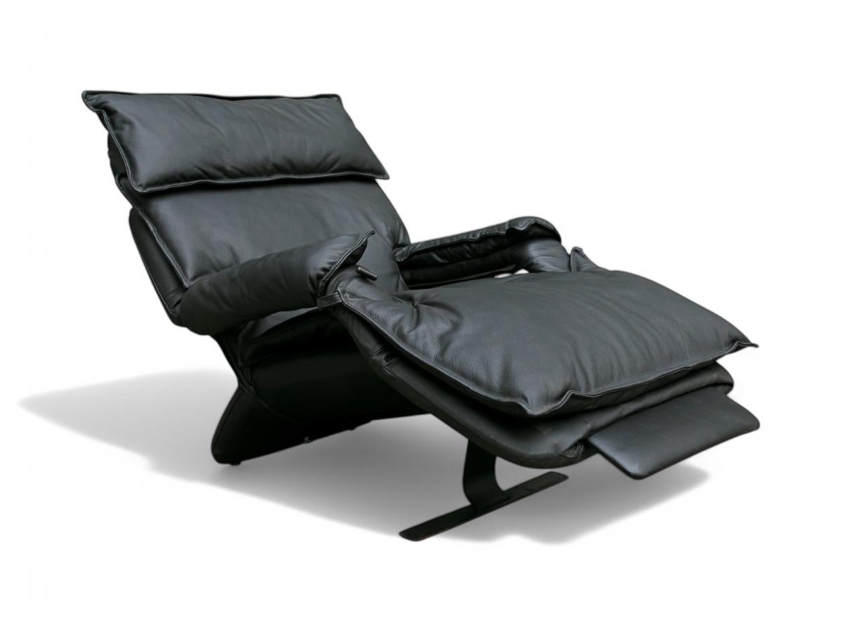 Available today, with domestic shipping in NYC metro area included, this  Modern Reclining Chair in Leather by Percival Lafer, c. 1980s made in Brazil  is nothing less than spectacular. 

The super comfortable piece is made with an iron frame and