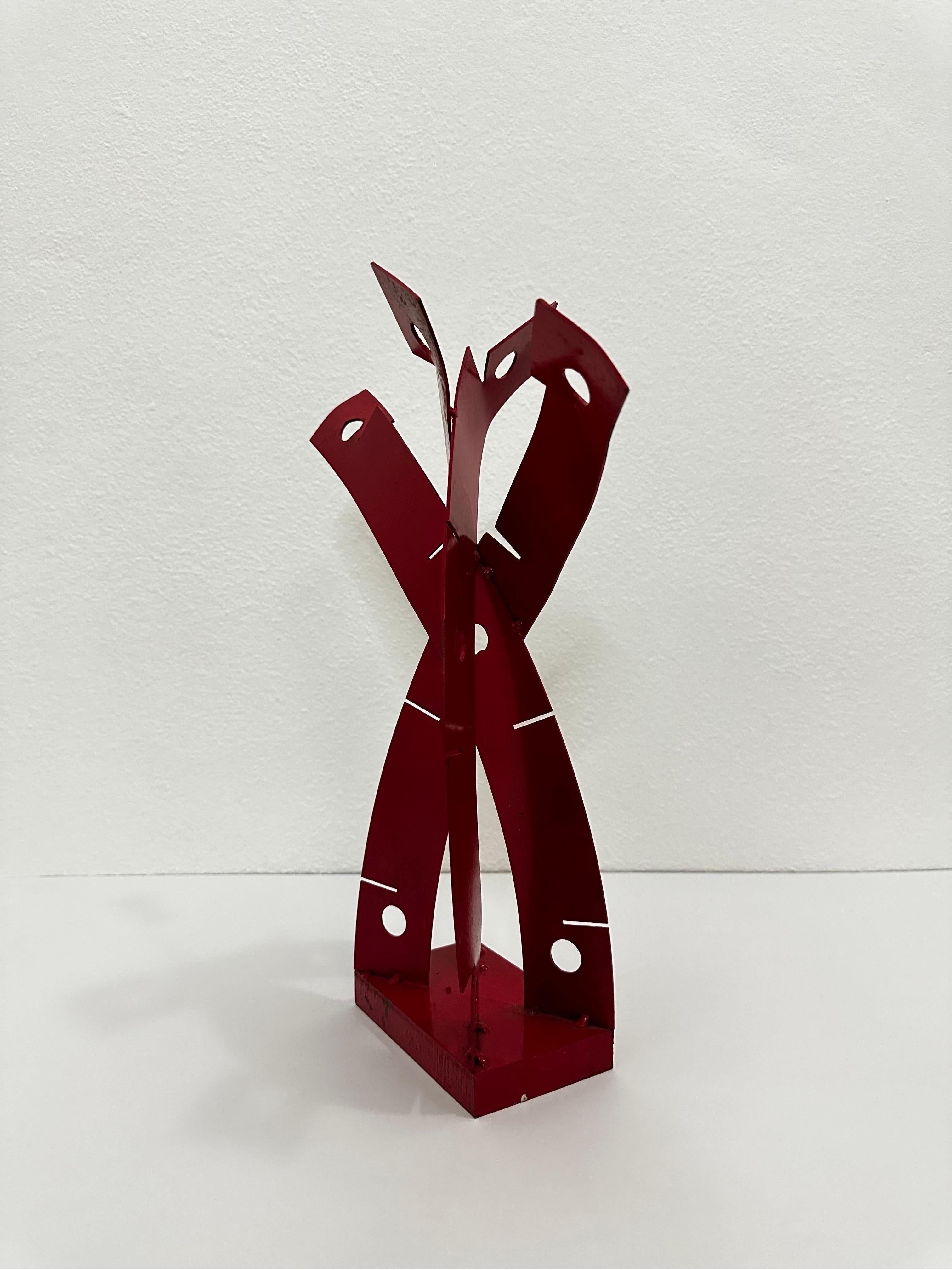 Red lacquered abstract steel table sculpture, unsigned.  Brazil 1980s.
