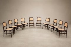 Brasilianisches modernes Set aus zehn Stühlen aus Palisanderholz und Rattan, Joaquim Tenreiro, 1960er Jahre