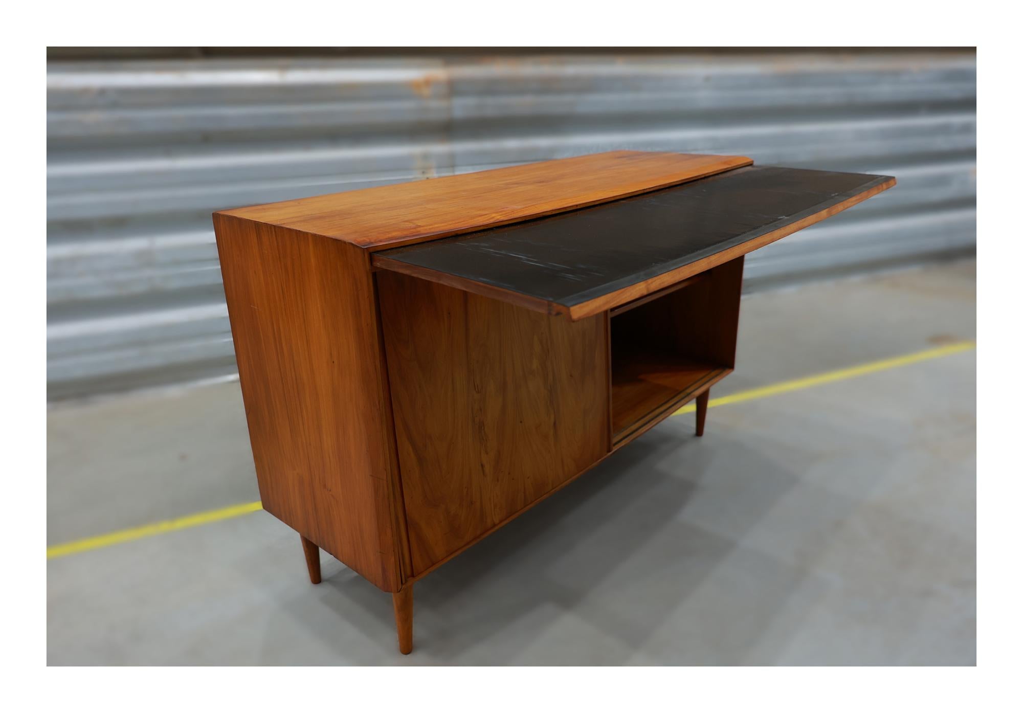 Available now, this Brazilian Modern Sideboard in Caviuna Wood by Carlo Hauner & Martin Eisler, is beautiful!

This formidable sideboard was designed by Carlo Hauner and Martin Eisler for Moveis Artesanais, the design duo’s first company and