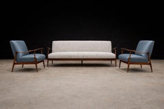 Sofá moderno brasileño de madera noble y boucle marfil de Giuseppe Scapinelli, 1950