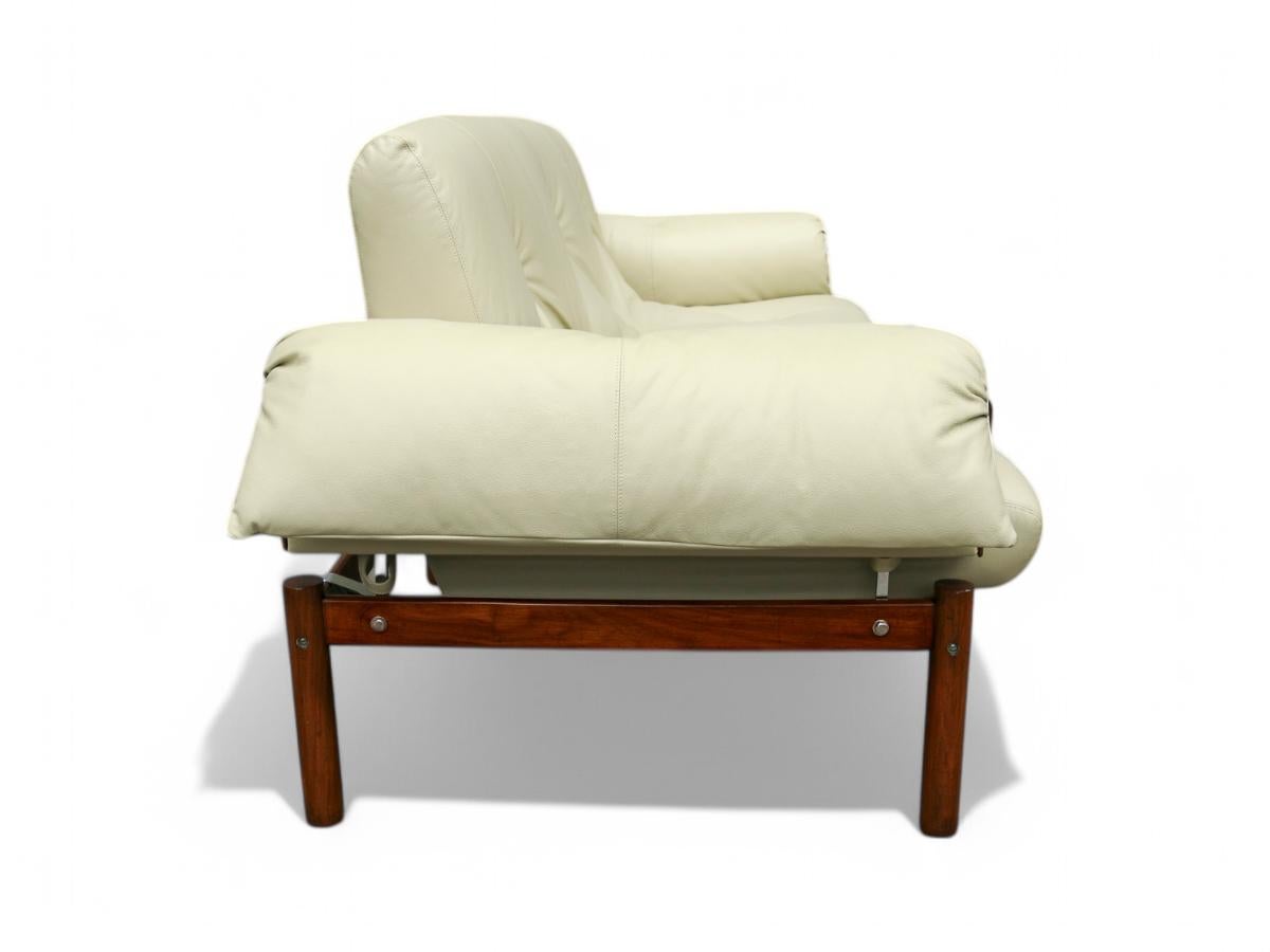 Available today, this Brazilian Modern sofa, model MP-13, designed by Percival Lafer in Hardwood and Beige Italian leather, 1960s is nothing less than fabulous! 

This spectacular sofa fits three comfortably and features a Brazilian Rosewood
