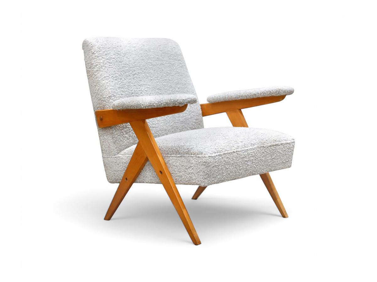 Available today, with domestic shipping in the NYC metro area included, this Brazilian Modern “Z” Armchair in Hardwood and Boucle, Jose Zanine Caldas, c. 1950s, is nothing less than gorgeous!
 
The Z armchair, crafted from solid ivory or 'Pau