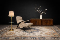 Chaise longue moderniste brésilienne en pau marfim bouclé teinté d'ébène, années 1950