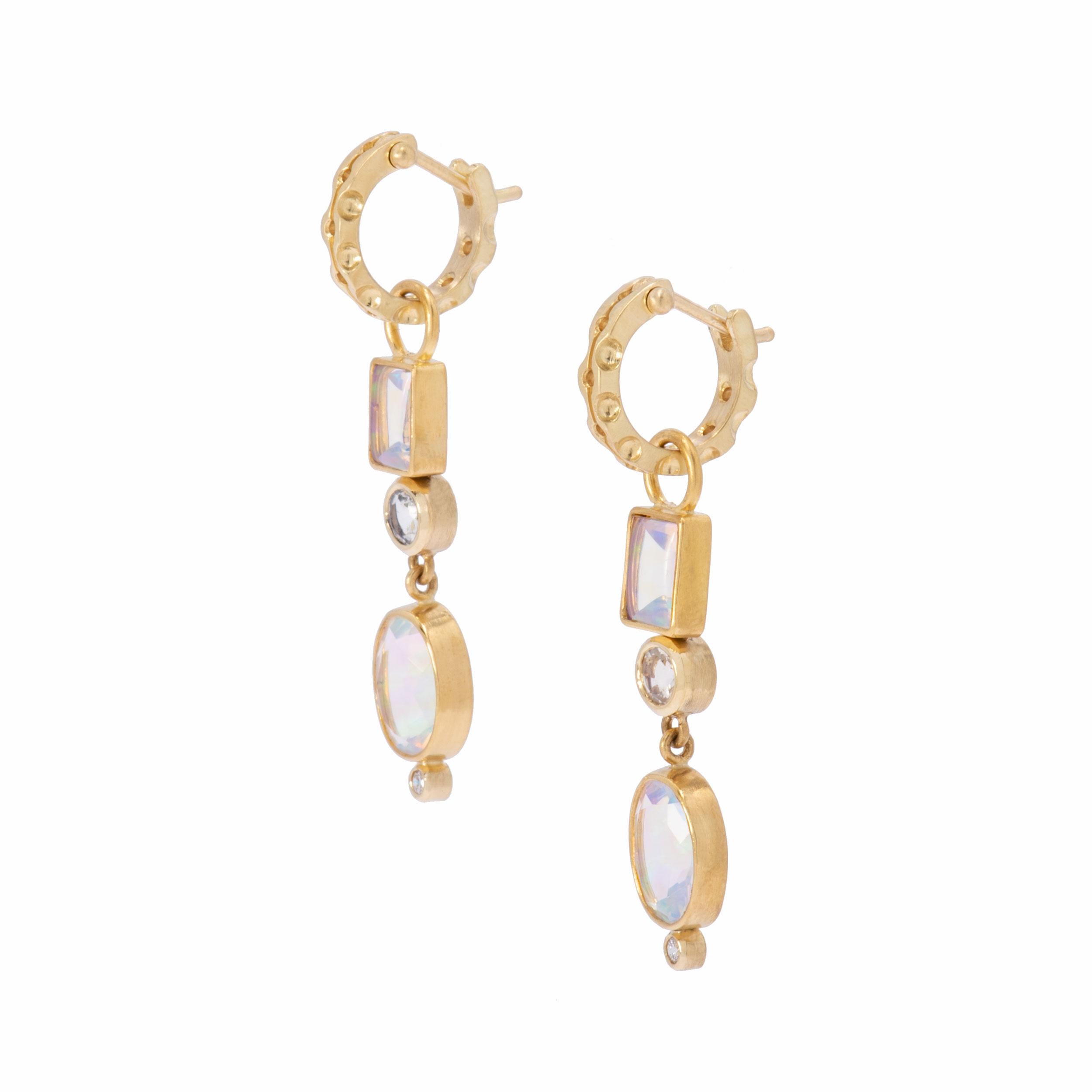 Diaphanous Brazilian Opals 5.05 tcw. deliver volumes of flash in Victorian Keyhole Drop Earrings set in 22k and 18k gold. Faceted ovals and faceted cushiony, emerald cut Brazilian opals top and bottom are punctuated with milky moonstones .67tcw. and