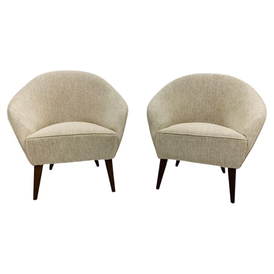 Brazilian pair of armchairs in fabric and noble wood circa 1960.
