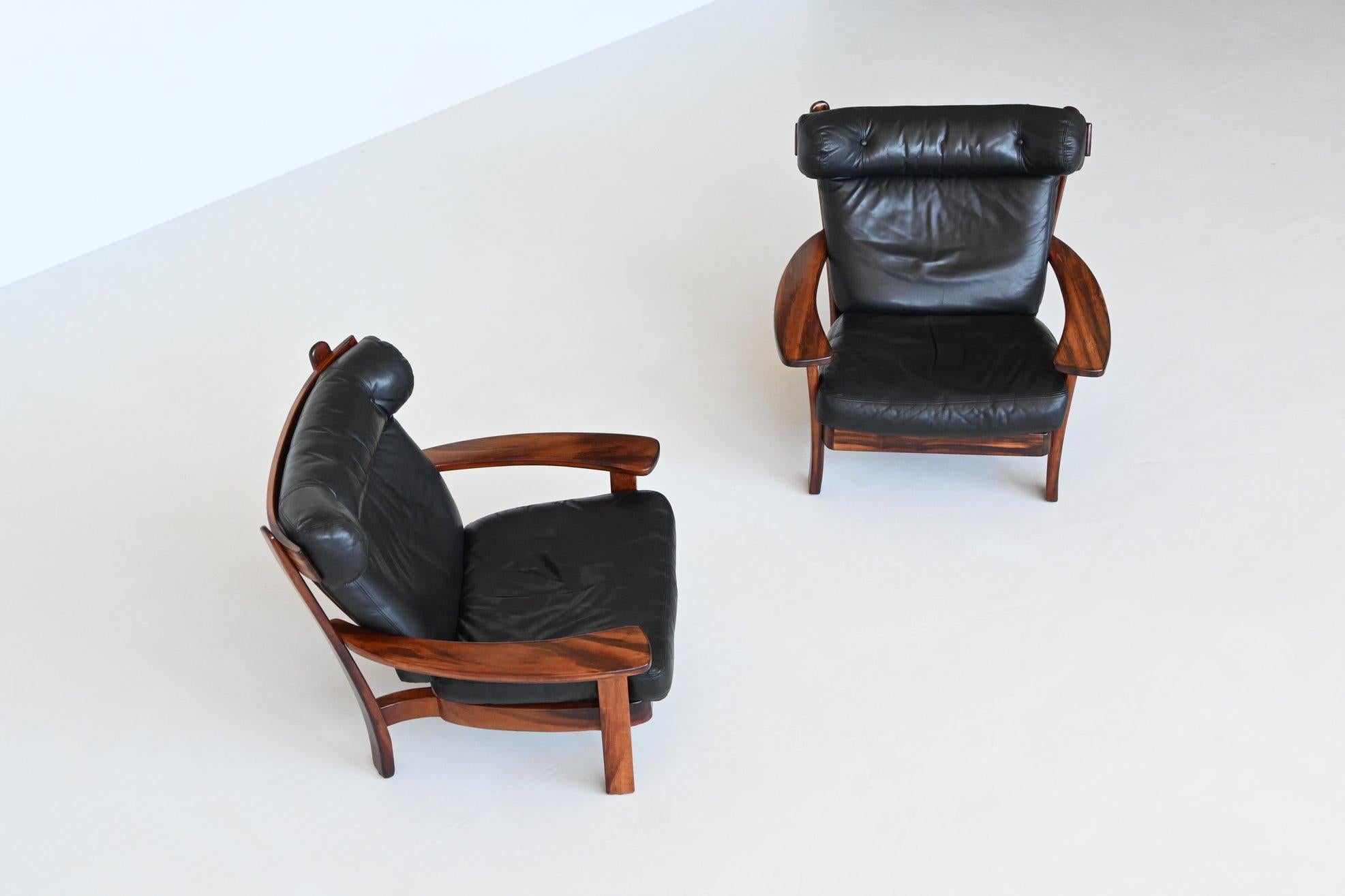Mid-20th Century Brazilian pair of Ox lounge chairs hardwood and leather Brazil 1960