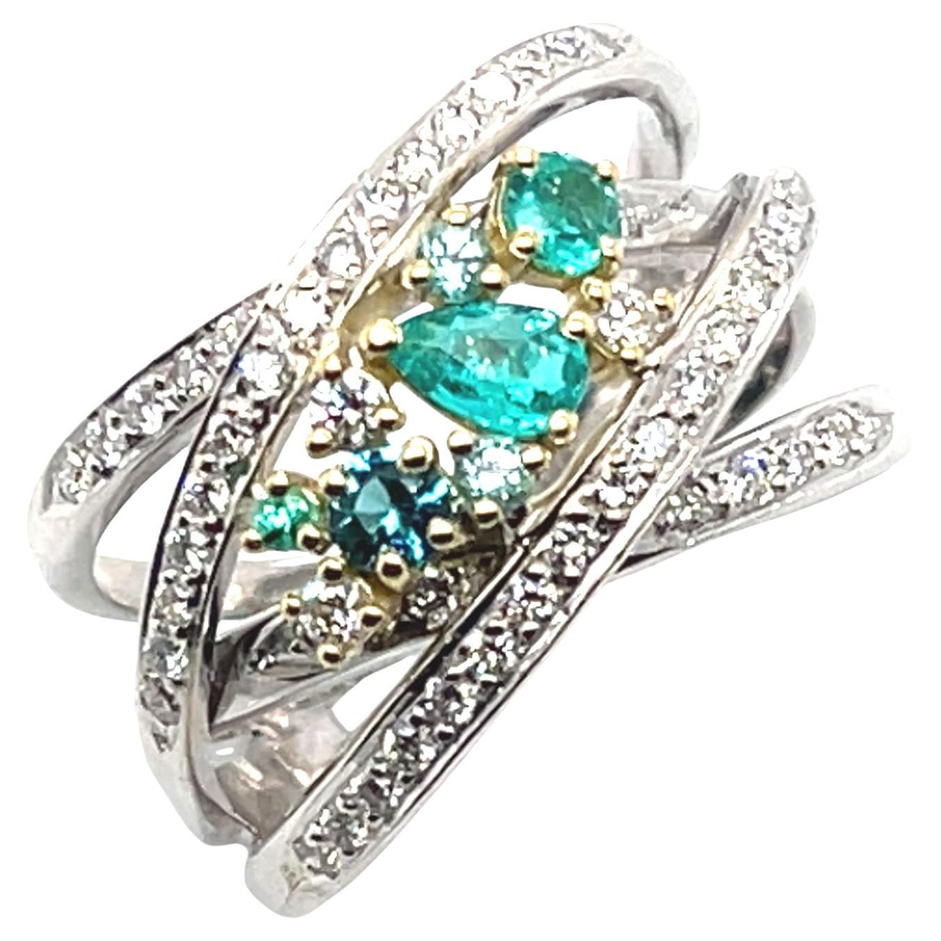 Bague enveloppante en or blanc/jaune 18k avec tourmaline brésilienne Paraiba et diamant