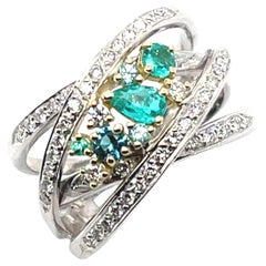 Bague enveloppante en or blanc/jaune 18k avec tourmaline brésilienne Paraiba et diamant
