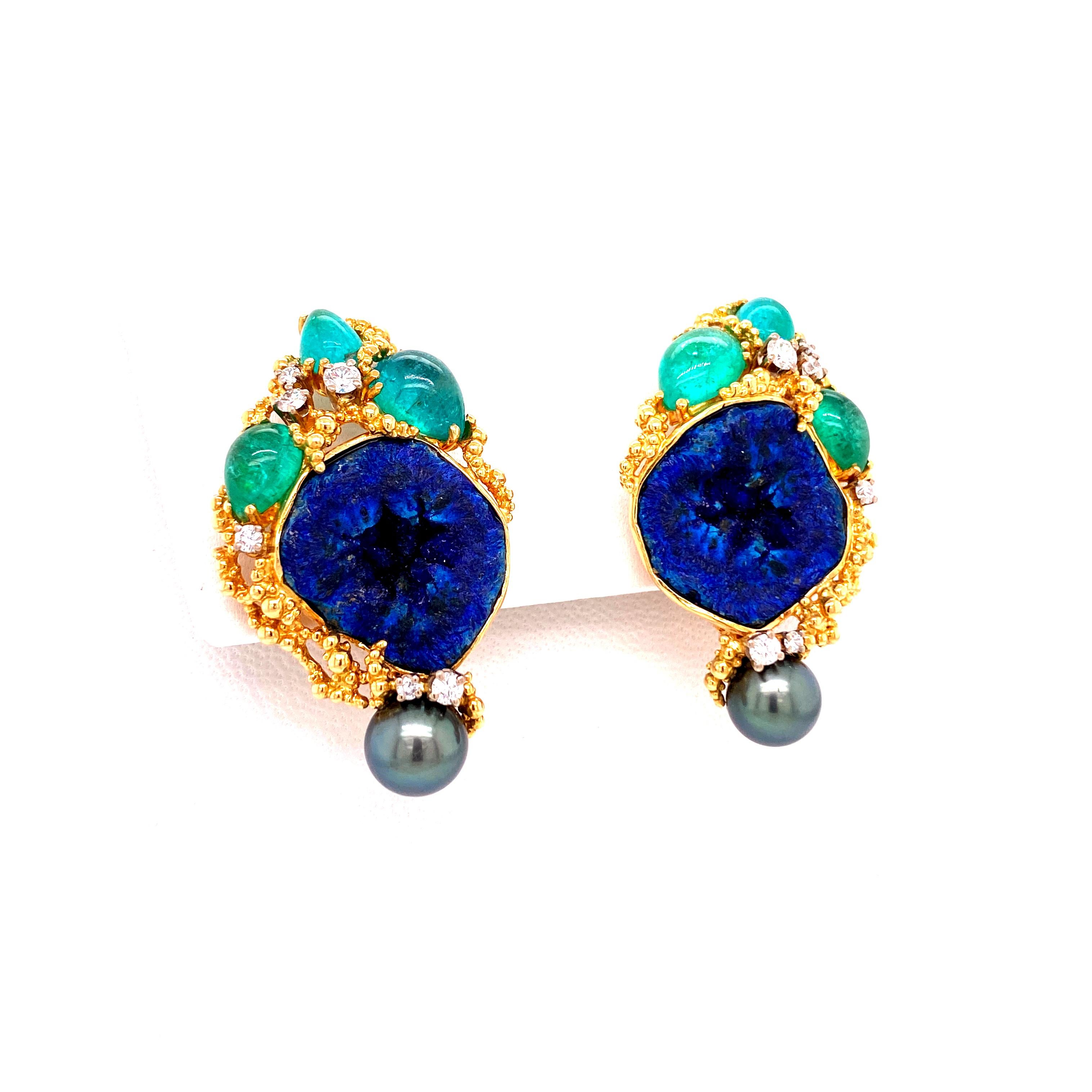 These artistic earclips by Gilbert Albert feature two Azurite geodes and 6 pear shaped brazilian paraiba tourmalines of electric neon blue and blue-green color, total weight approximately 8.00 carats. Accented by 12 brilliant cut diamonds of G/H