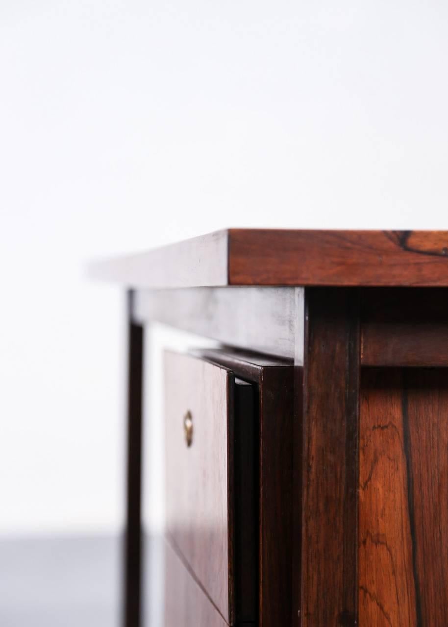 Nice desk from Brazil made of Rio rosewood.
Small piece of sticker under the top.
Two pendant drawers.
