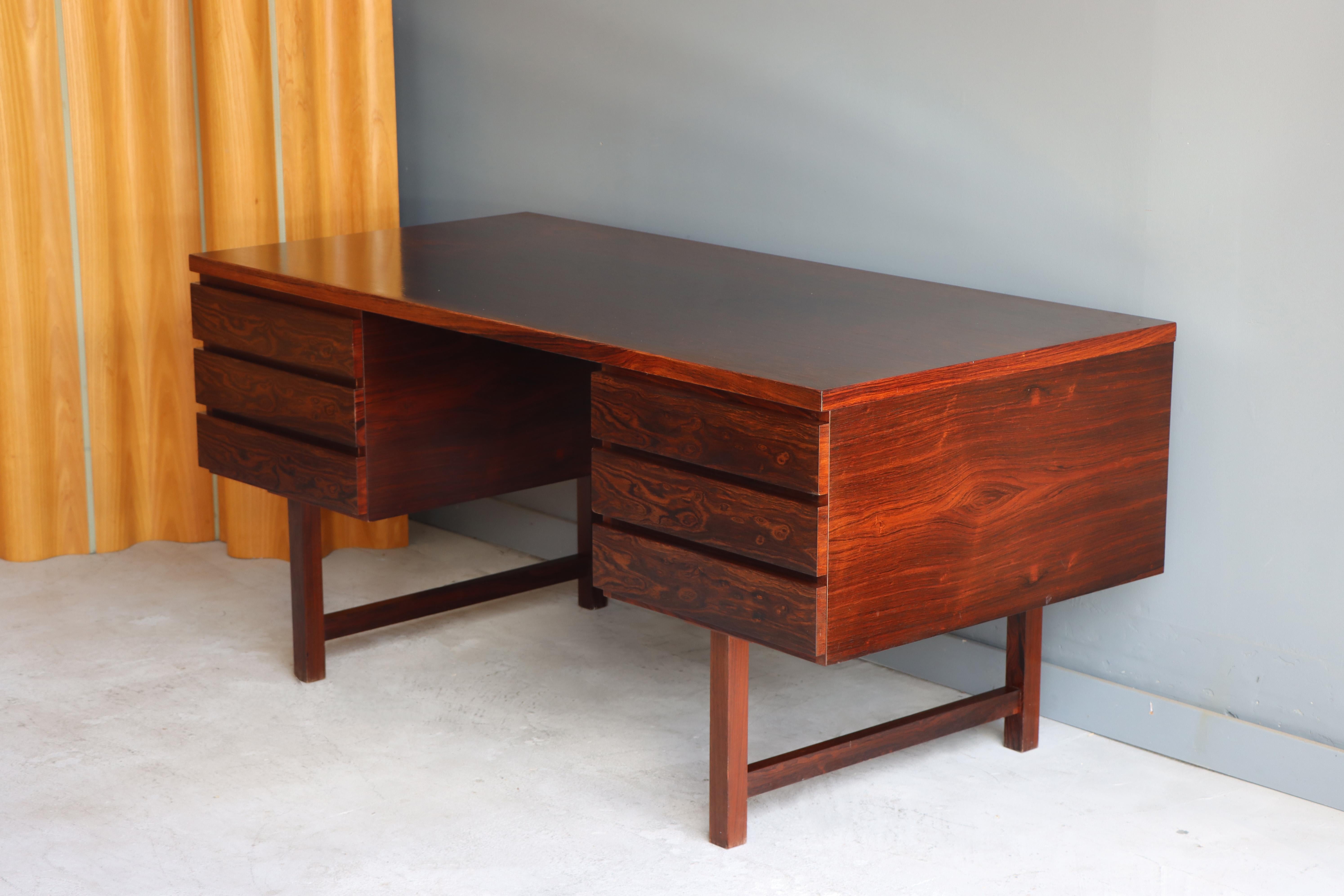 Brazilian Rosewood free standing desk by Kai Kristiansen for Feldballes Møbelfabrik 1960s, Denmark. 

Having open storage on its backside and a finished back allows the desk placed in the center of the room and being attractive from every