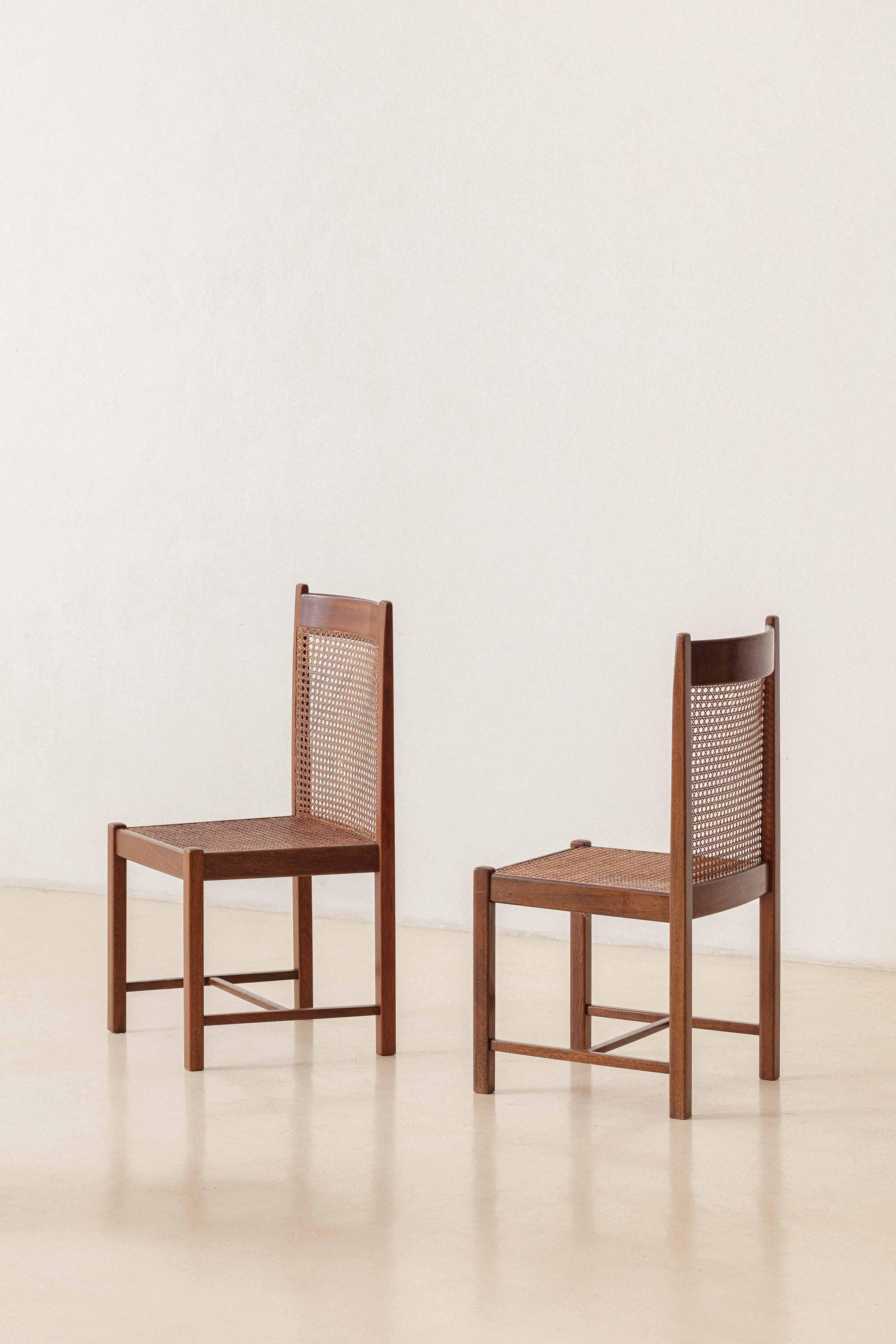 This set of eight Freijo wood chairs was manufactured by Fatima Arquitetura Interiores (FAI) in the 1960s.

These pieces called our attention for many design reasons. First, the combination between seat and back as a single cane volume. Second,