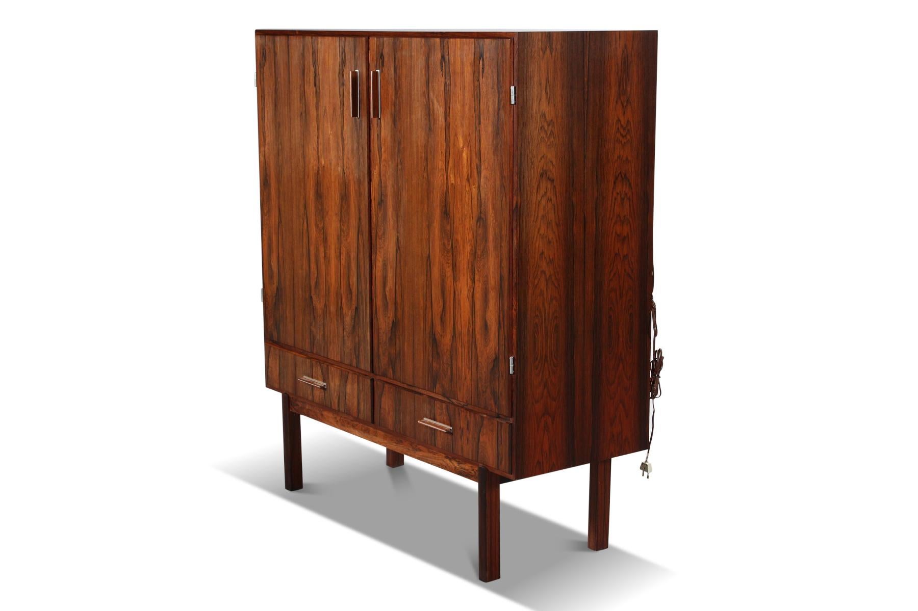 Origin: Denmark
Designer: Axel Christiansen
Manufacturer: ACO Møbler
Era: 1960s
Materials: Rosewood
Measurements: 47.25? wide x 18? deep x 50? tall

Condition: In excellent original condition with typical wear for its vintage. Price includes
