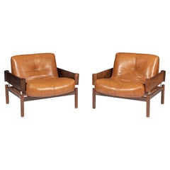 Brazilian Rosewood/faux leather lounge chairs 1960's