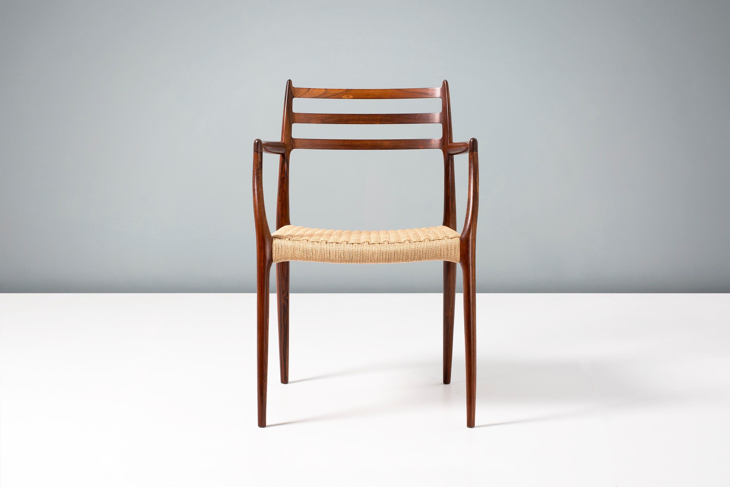 Niels Moller

Pair of model 62 armchair, 1962.

Rarely seen edition of this iconic design made from exquisite, highly figured Brazilian rosewood. Designed by Niels Moller for his own company: J.L. Moller Mobelfabrik in Denmark, 1962. This piece