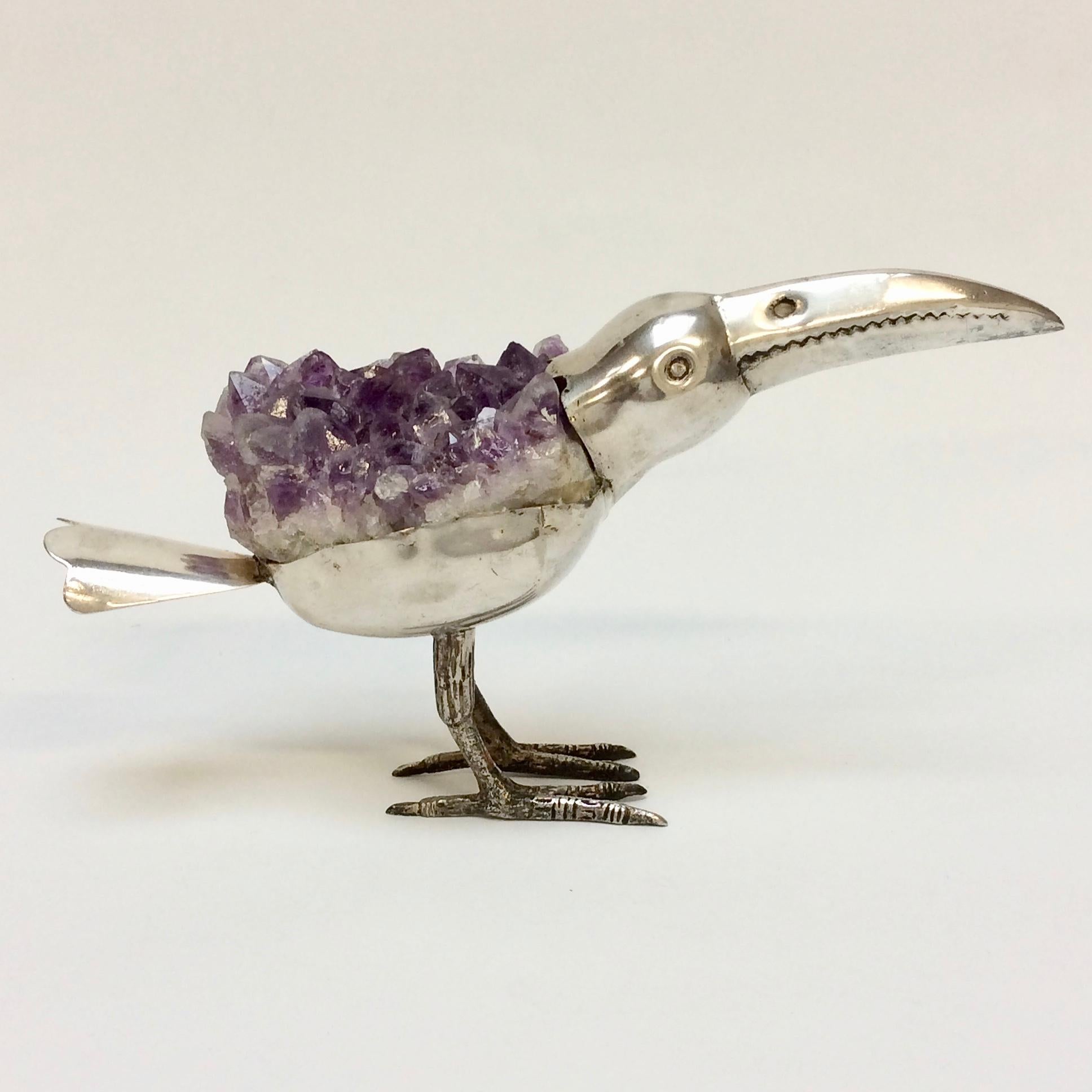 Nice decorative exotic bird.
Silver plated and amethyst, circa 1970, Brazil.
Stamped underneath Gerson BA P90.
Dimensions: 25 cm W, 12 cm H, 6 cm D.
All purchases are covered by our Buyer Protection Guarantee.
This item can be returned within 7 days