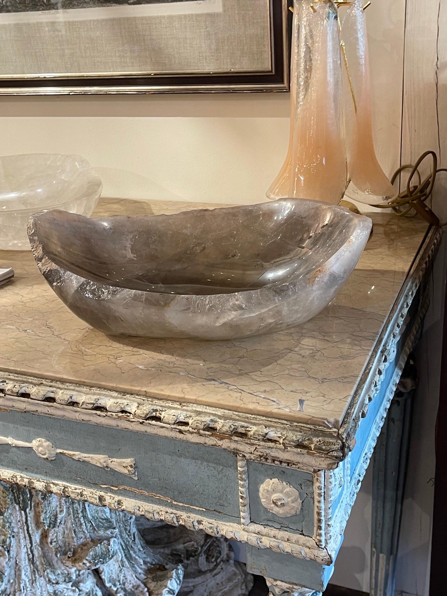 Beautiful smoke colored quartz rock crystal bowl from Brazil. A gorgeous accessory and a real conversation piece!