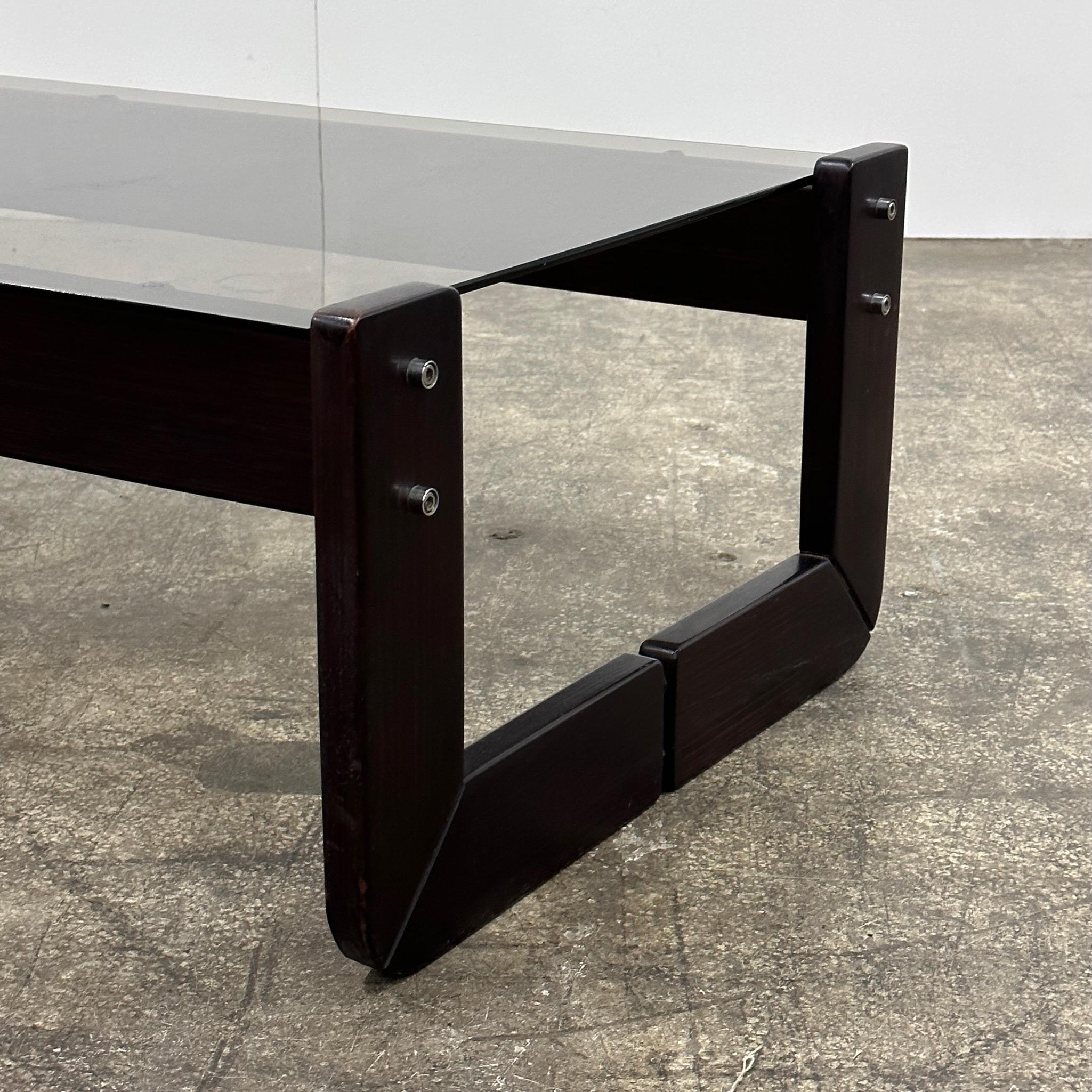 c. 1970s. Table by Percival Lafer made of Jacaranda wood. Made in Brazil, smoked glass top.