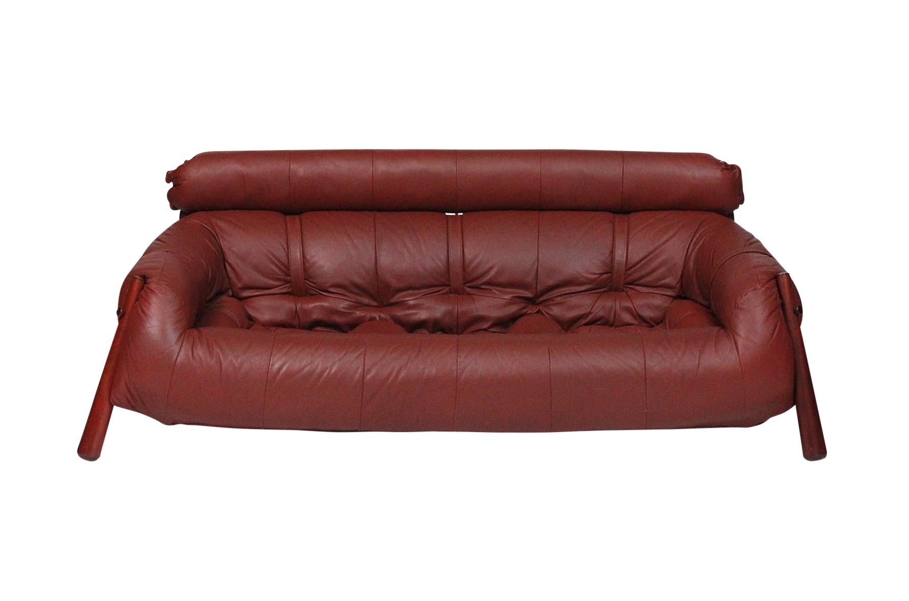 Sculptural sofa in exotic wood and brown leather by Brazilian designer Percival Lafer.

____

We're offering our customers free domestic shipping on all items during the current health crisis. We will also offer free or deeply discounted