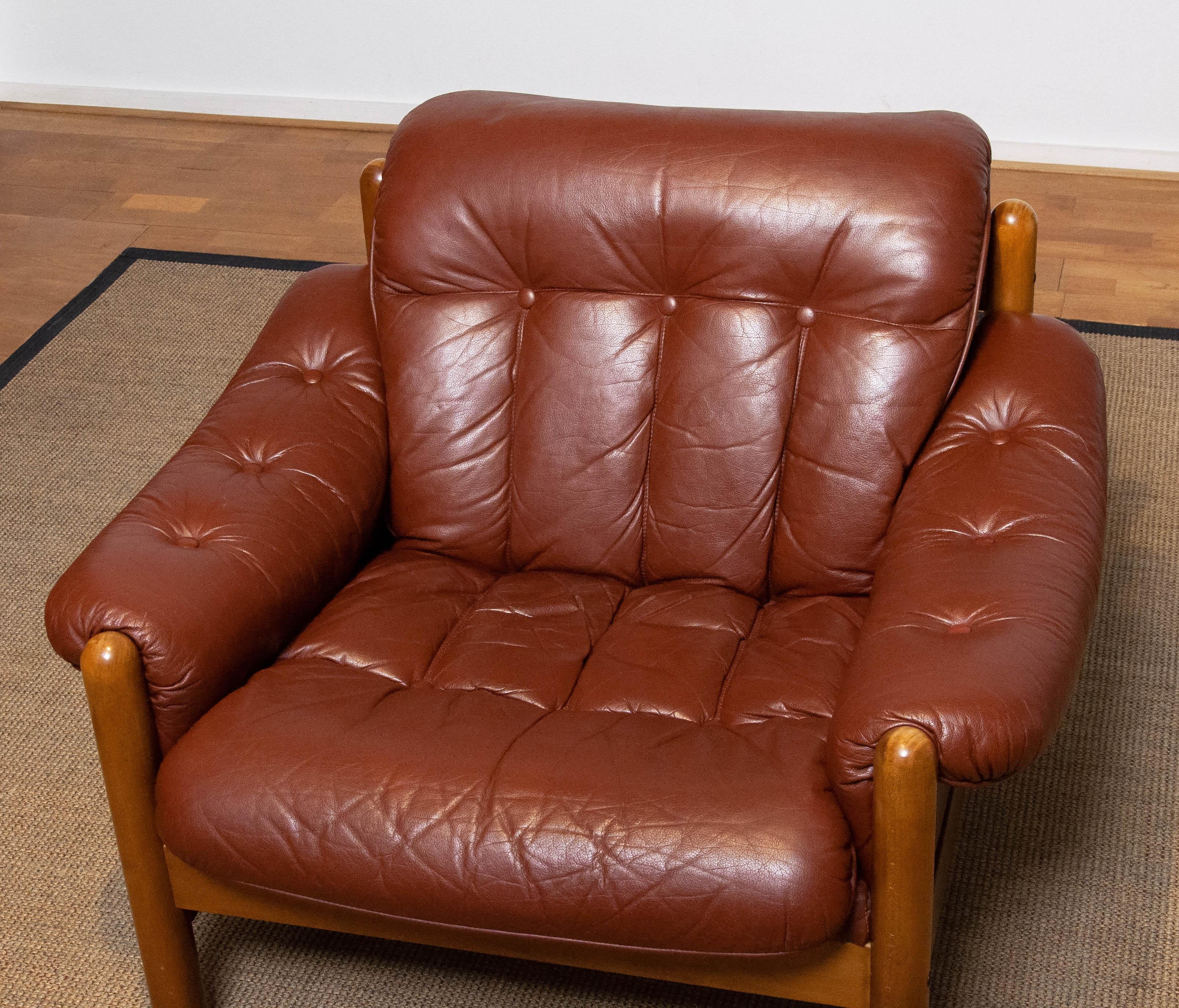 Beautiful Brutalist / Brazilian style lounge chair made by Göte Möbler Nässjö in Sweden in brown leather. The wooden construction is made of beech. Sits absolutely very comfortable even for a longer period. Allover in good condition but the chair