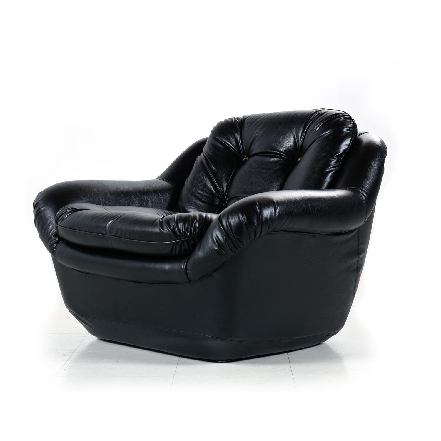 Mid-Century Modern Overman style pod chair with unique chorded buttons. This magnificent lounge chair is all original! The time capsule quality chair is outfitted in original black Naugahyde (high quality faux leather vinyl). The buttons have a