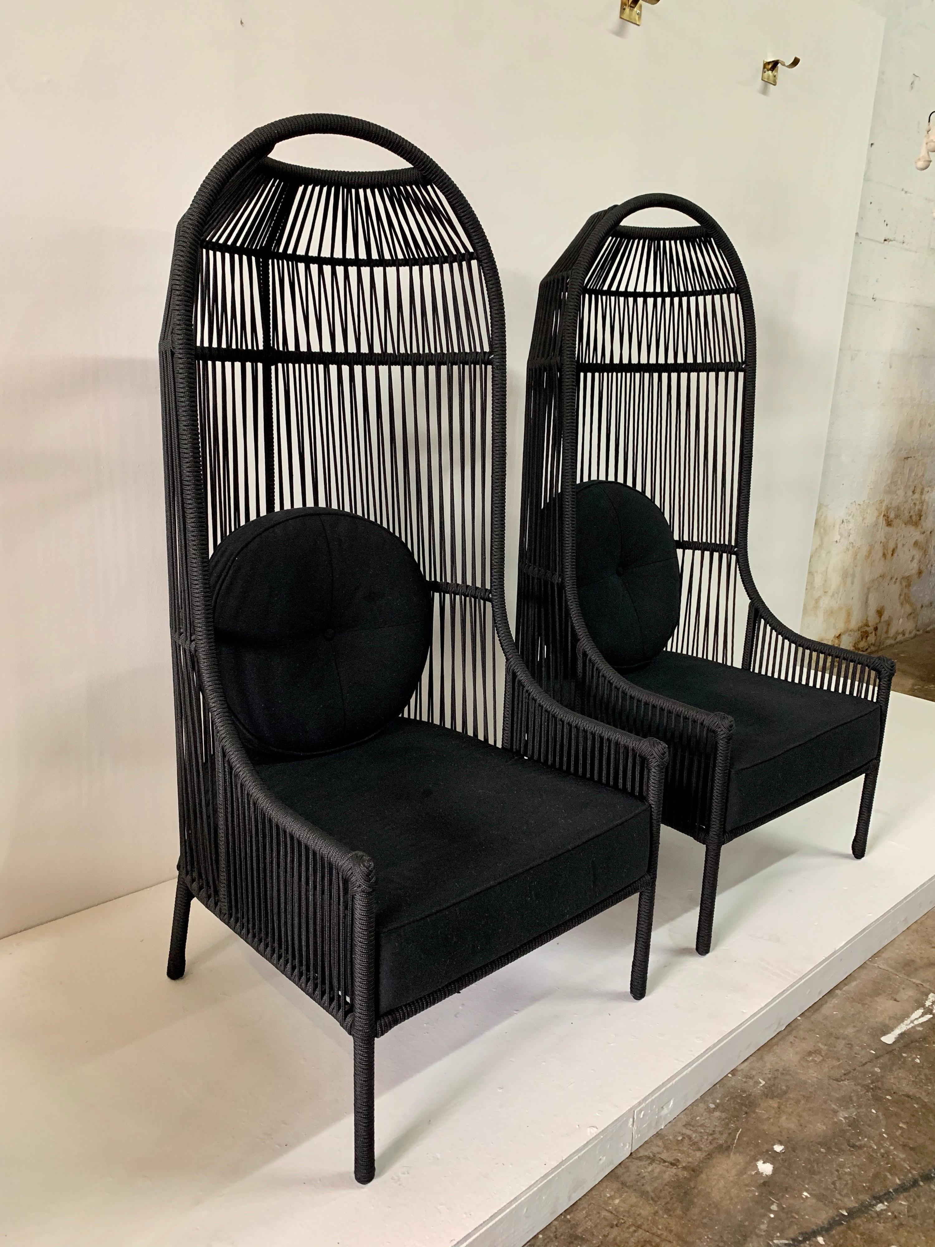 Frame in steel and woven in polyester nautical rope, this pair of black rope canopy or cocoon chairs with black cushions. Perfect for indoor or outdoor use.