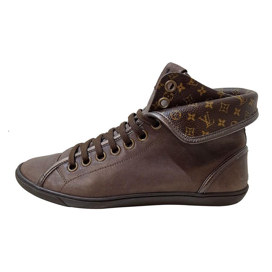 Leather Brown color LV Monogram Laced Light abrasion on back of right shoe (see image)
