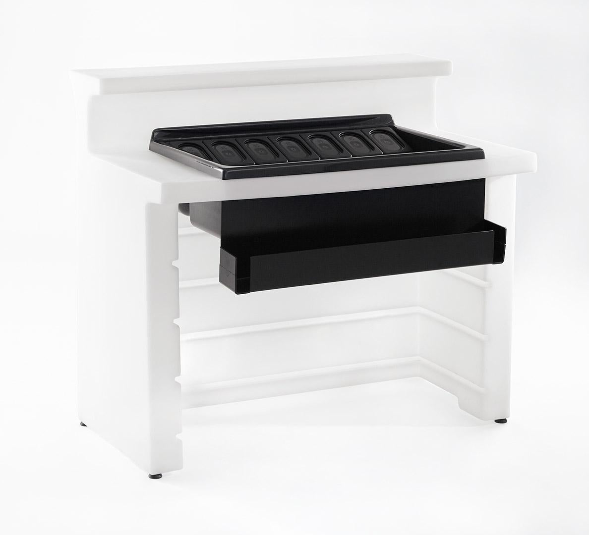 Break Line Lighted Bar Counter by SLIDE Studio
Dimensions: D 75 x W 120 x H 110 cm.
Materials: Polyethylene.
Weight: 48,5 kg.

This product is suitable for indoor and outdoor use. Available in a lighted version. Additional details on glass or steel