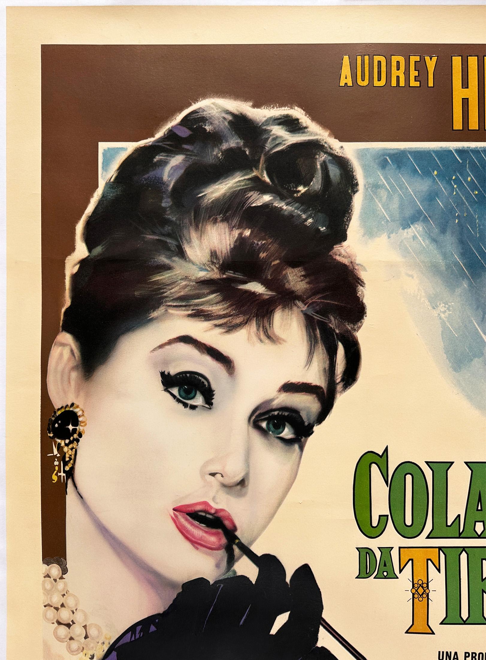 Nous adorons l'affiche du film italien Breakfast at Tiffany's, un classique des années 60. Le design d'Enzo Nistri est tout simplement fabuleux, ma chérie !

Cette affiche de film vintage a été professionnellement doublée de lin et mesure 39 1/4 x