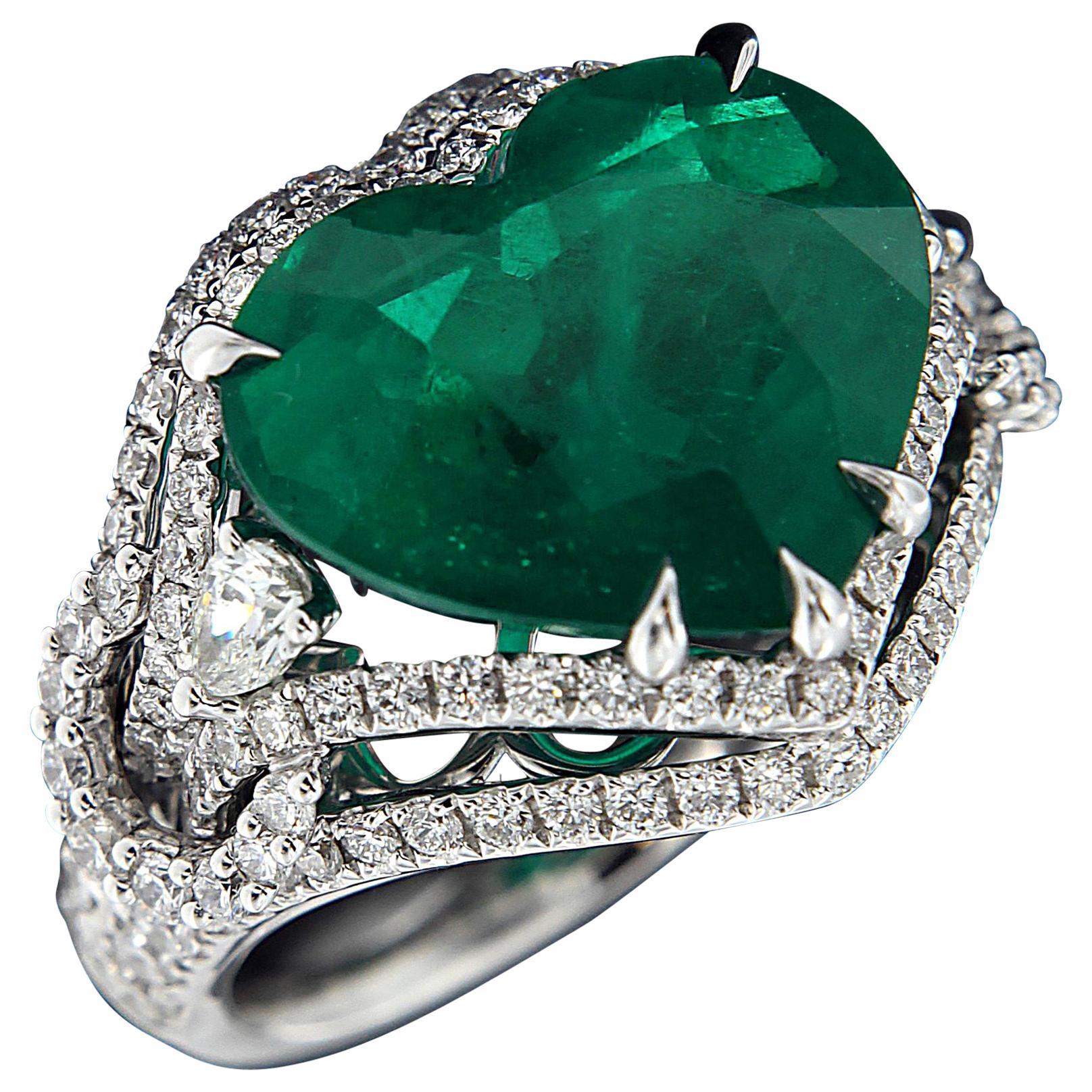 Breathtaking 18 Karat White Gold, Diamond and Emerald Ring For Sale