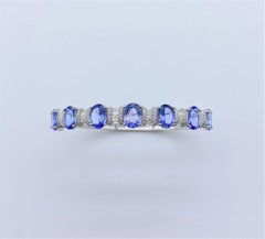 Bracciale mozzafiato in oro 18KT con diamanti e tanzanite 9.50CT