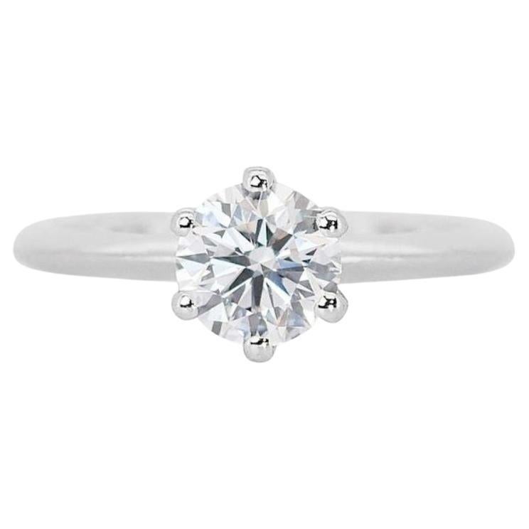 Breathtaking 1ct. Round Brilliant Diamond Ring set in 18K White Gold For Sale