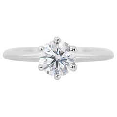 Breathtaking 1ct. Round Brilliant Diamond Ring set in 18K White Gold