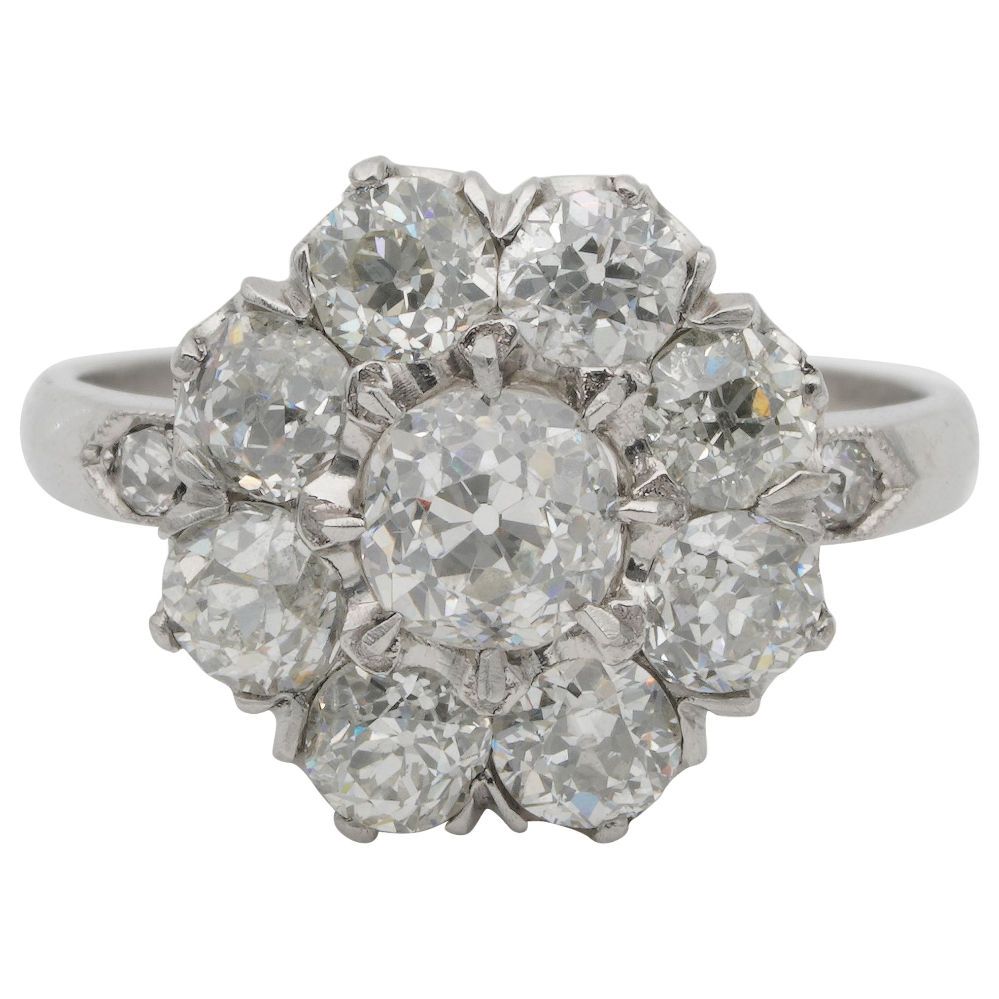 Breathtaking Edwardian 2.95 Carat Old Diamond Platinum Engagement Cluster Ring For Sale