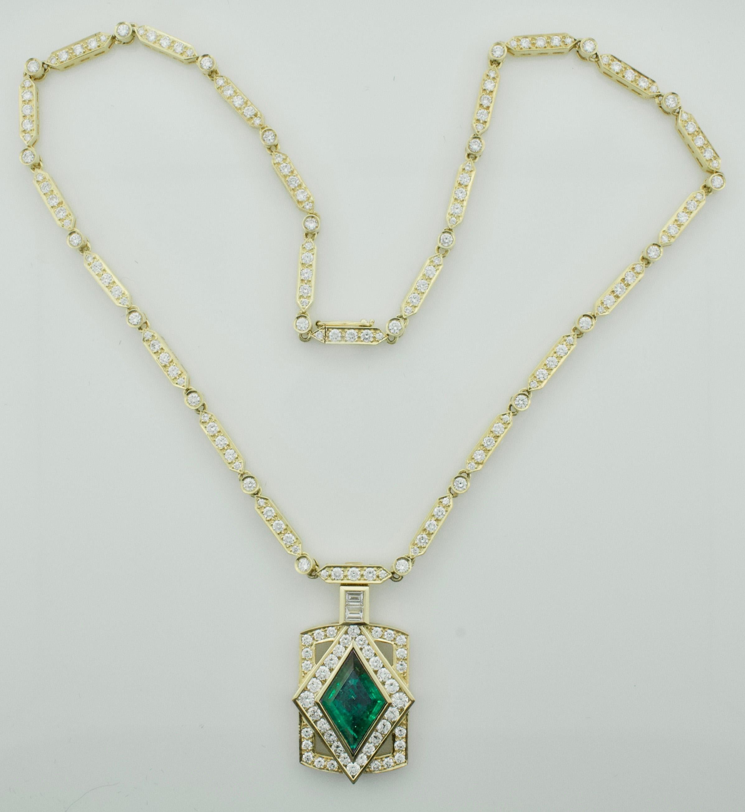Breathtaking Emerald and Diamond Necklace in 18k 3.75 Diamond Shaped Emerald
One Diamond Shaped Emerald weighing 3.75 carats
Two Baguette Cut Diamonds weighing .30 carats [GH - VVS-VS1]
Eighty Eight Round Brilliant Cut Diamonds weighing 5.50 carats 