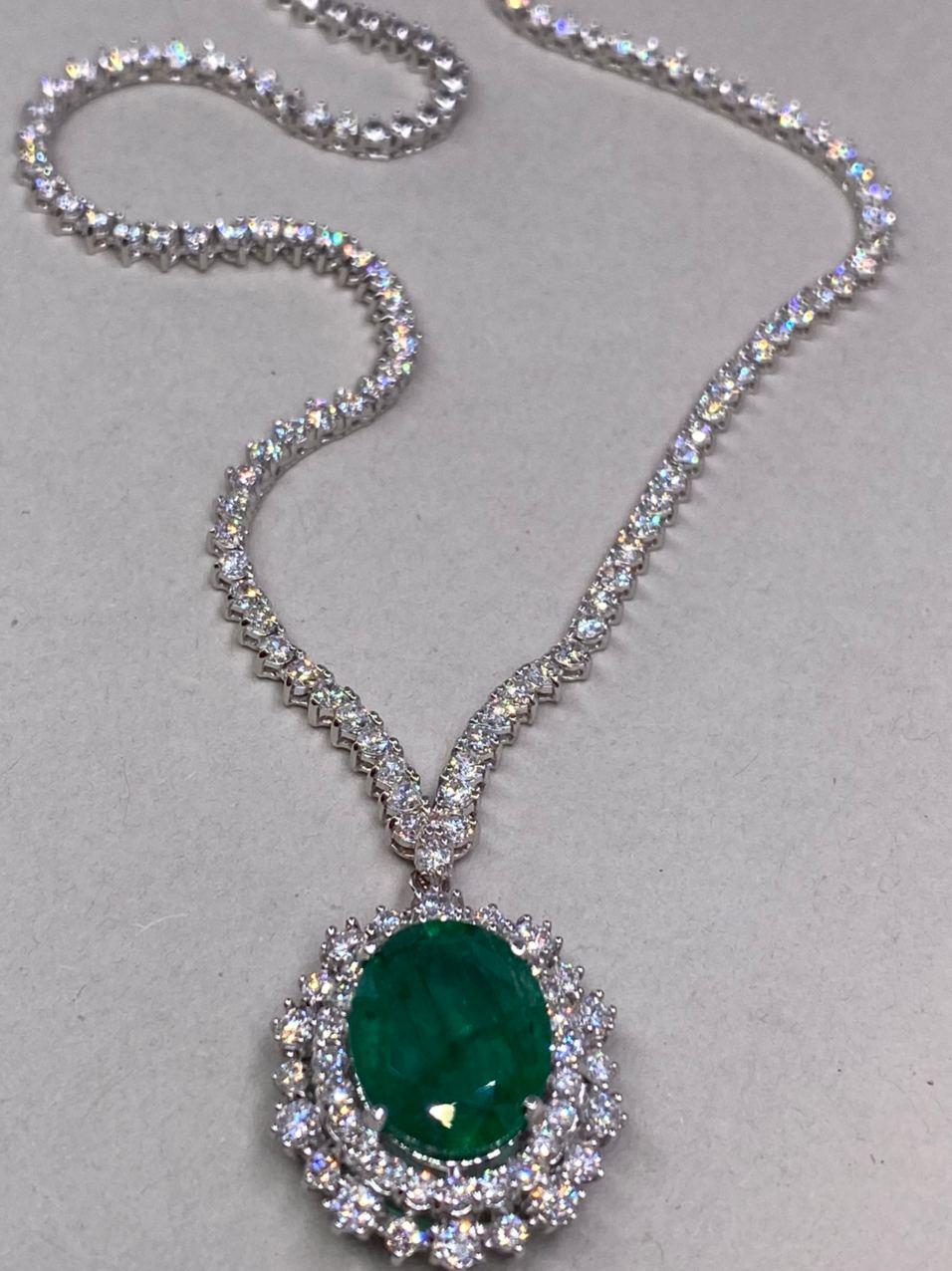 9.45 CTW Emerald 18K White Gold Diamond Necklace

Total Necklace Weight: 15.5 Grams
Necklace Length: 40.6 cm (16 Inches)
Emerald Weight: 5.25 Carat (12.701x10.00 Millimeters)
Diamond Weight: 4.20 Carat (F-G Color, VS2-SI1 Clarity)

With a heritage