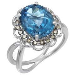 Anello solitario moderno e mozzafiato con diamante bianco e topazio blu in oro bianco per tutti i giorni