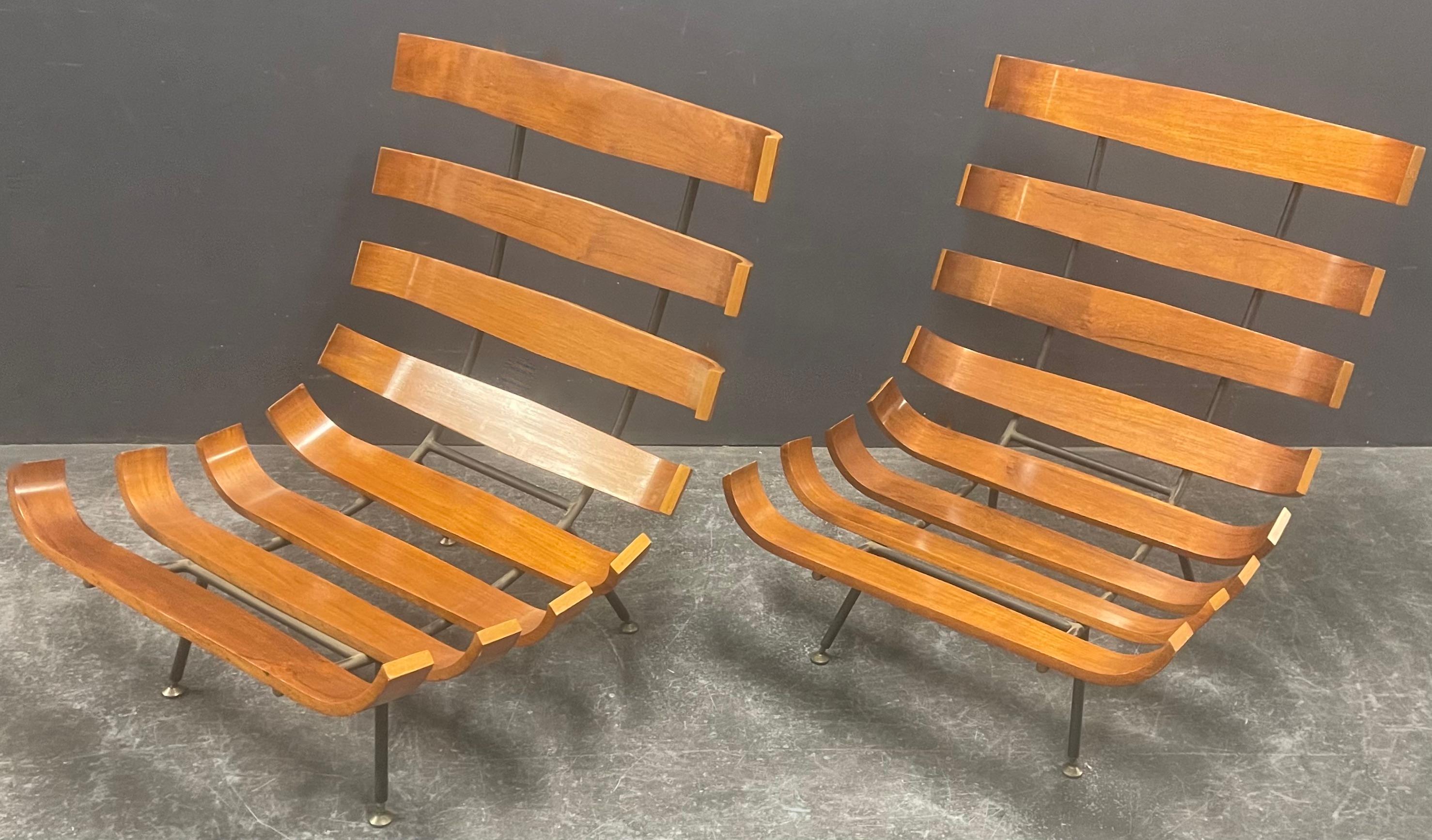 wonderful pair of Carlo Hauner and Martin Eisler lounge chairs. made by forma nova in the 1950thies and still in wonderful shape. the light walnut is very shiny and the edges are lighter, what gives the chair a very special look. all high adjustable