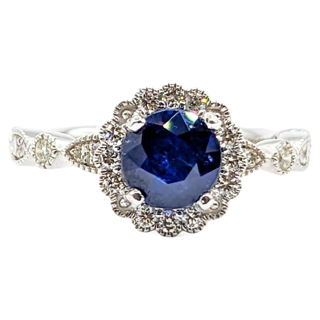 Breathtaking Platinum Vivid Sapphire & Diamond Halo Ring  For Sale
