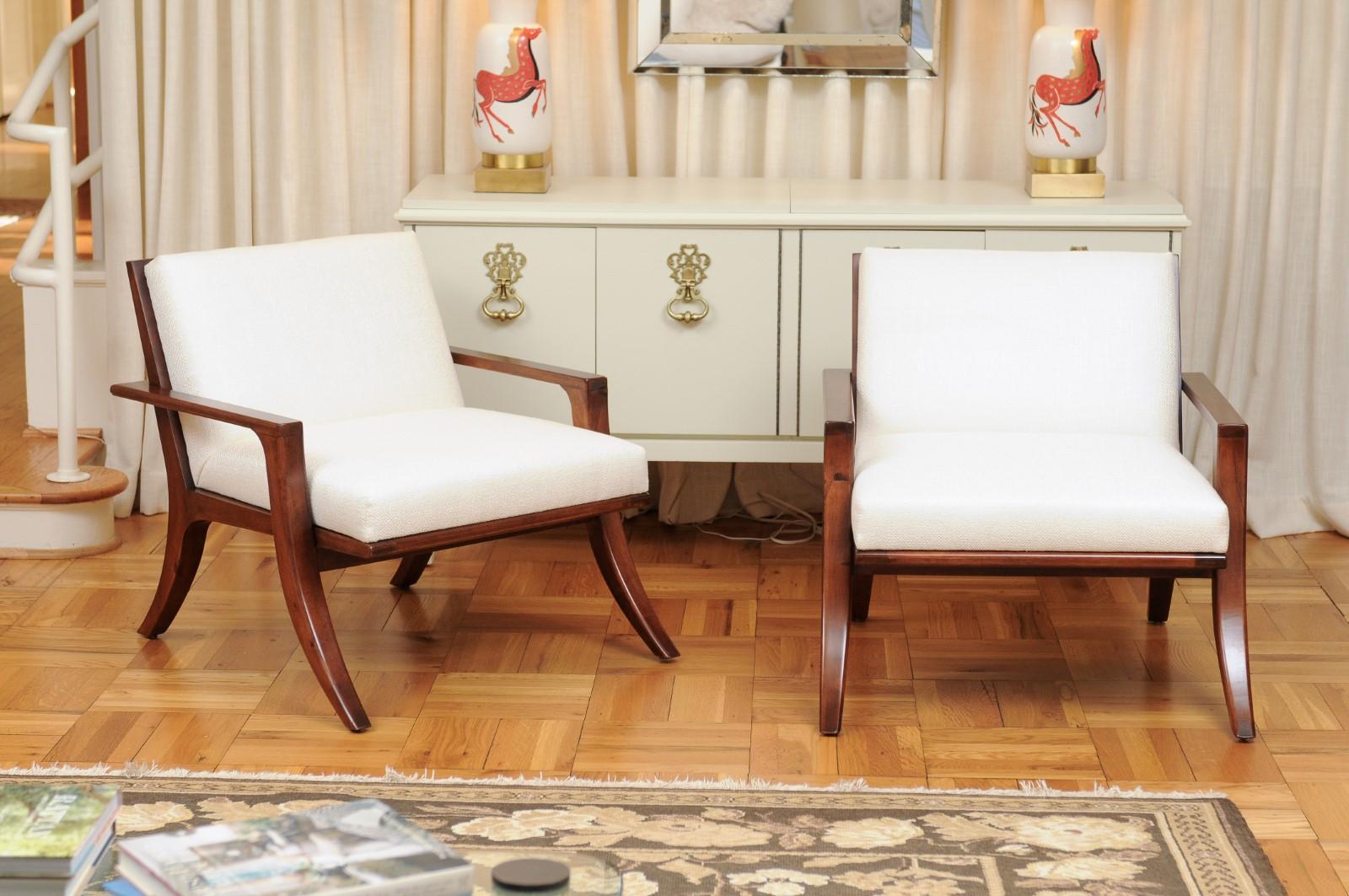 These magnificent lounge chairs are shipped as professionally photographed and described in the listing narrative: Meticulously professionally restored and installation ready. Expert custom upholstery service is available.

A fabulous restored